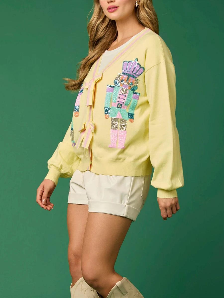 nutcracker bow + sequin cardigan - basil boutique