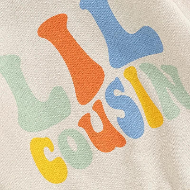 big + little cousin matching sweatshirts - basil boutique