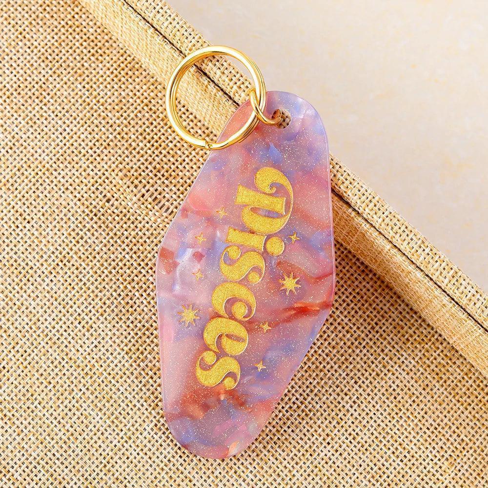zodiac keychain - basil boutique