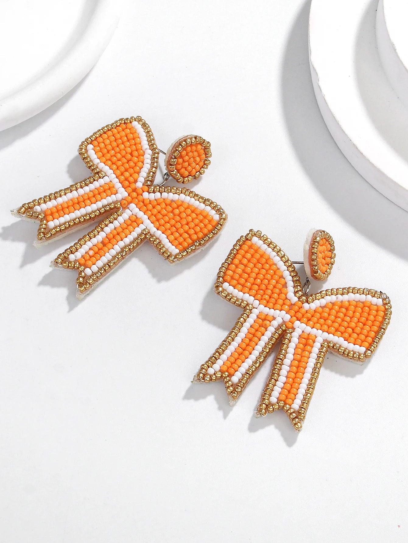 game day bow beaded earrings - basil boutique