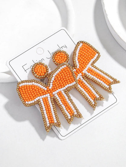 game day bow beaded earrings - basil boutique