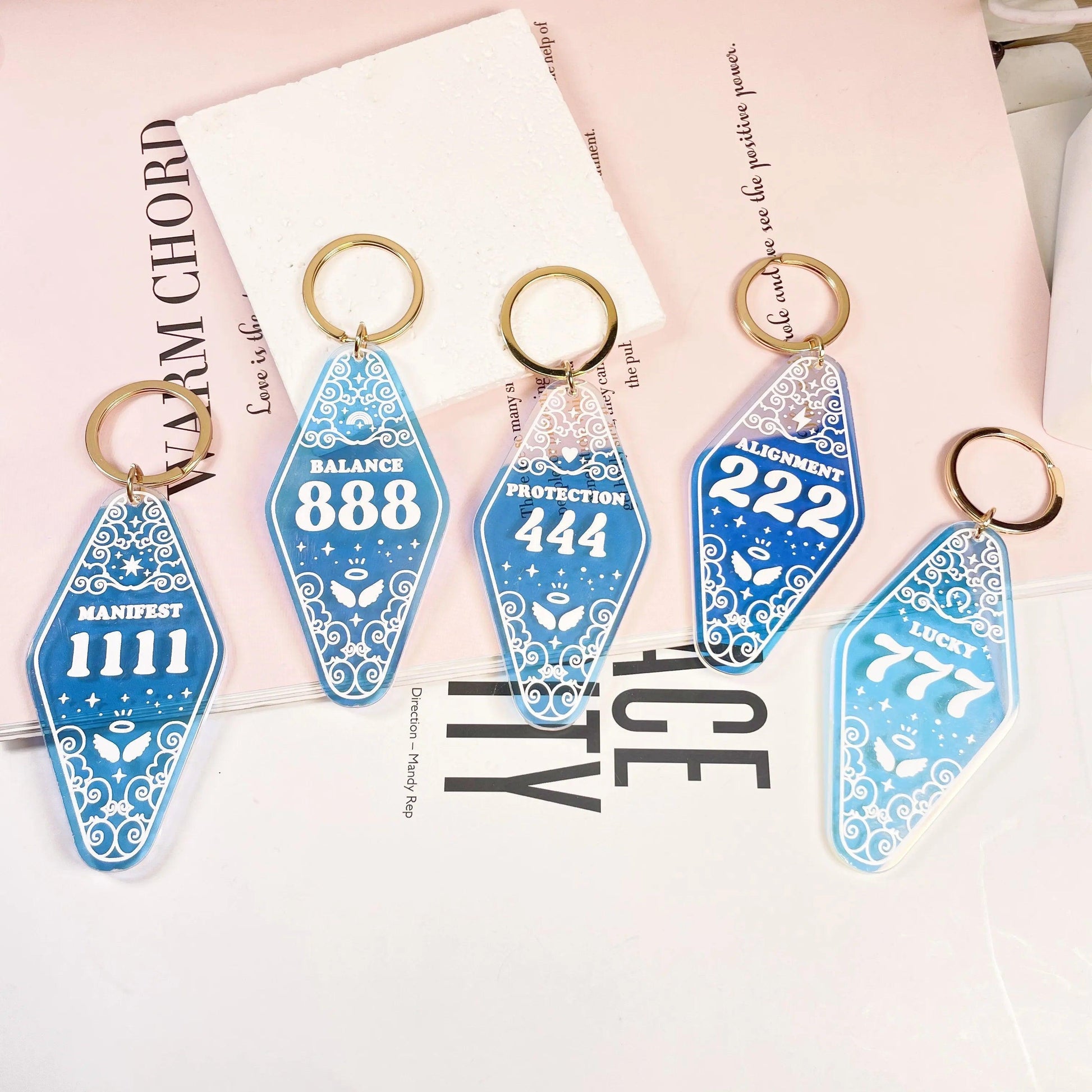 angel number holographic hotel key chains - basil boutique