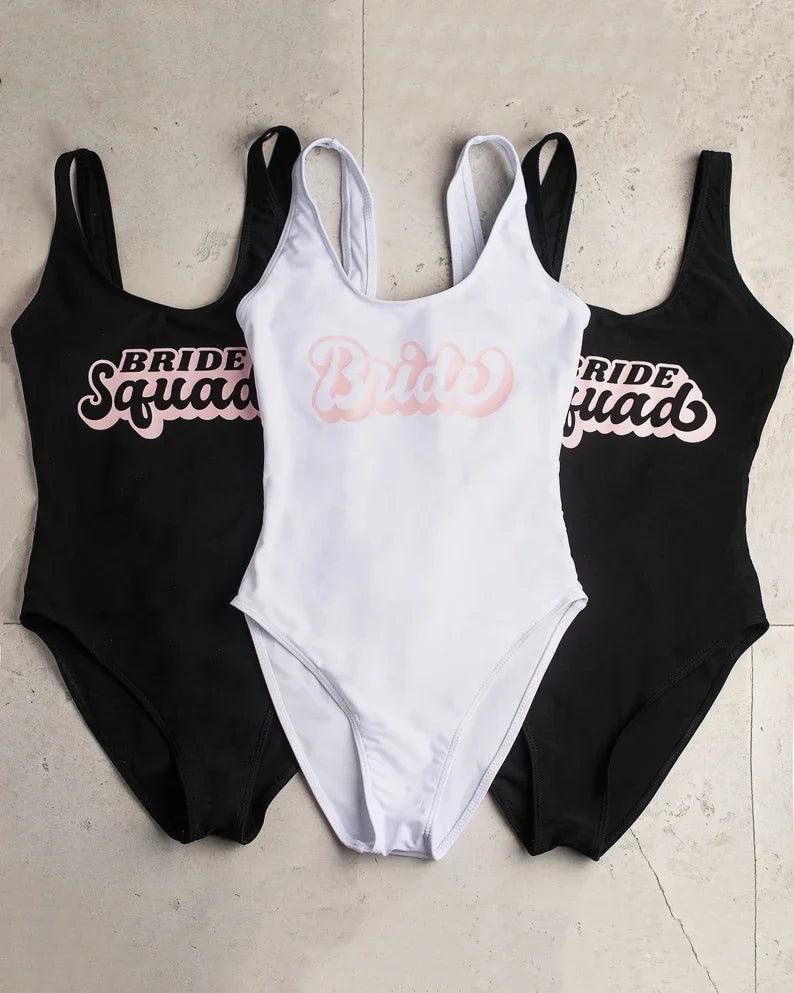 bride + bride squad retro one-piece swimsuits - basil boutique