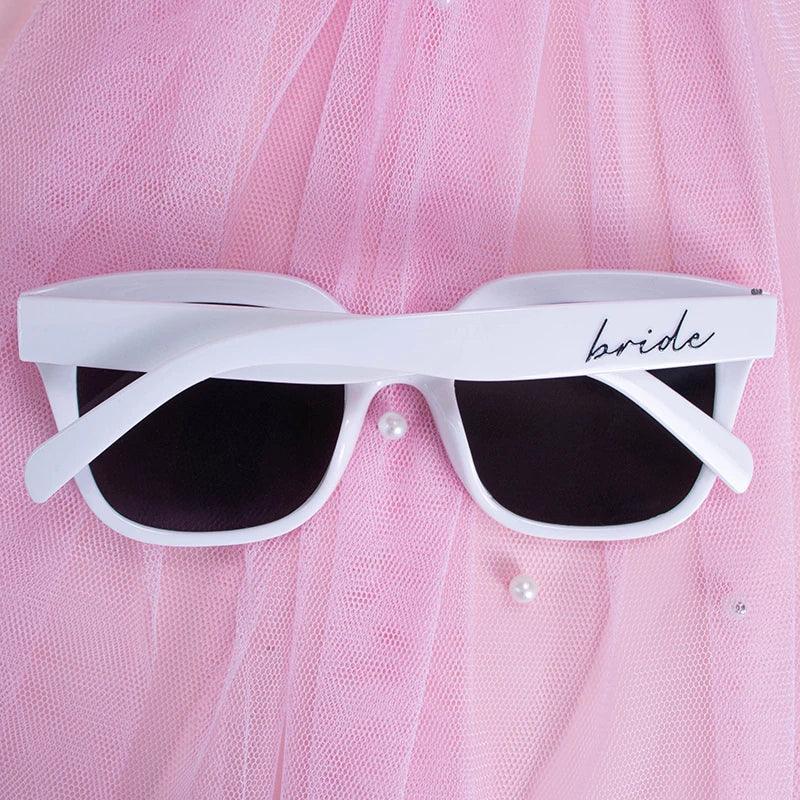 bride + groom matching sunglasses - basil boutique