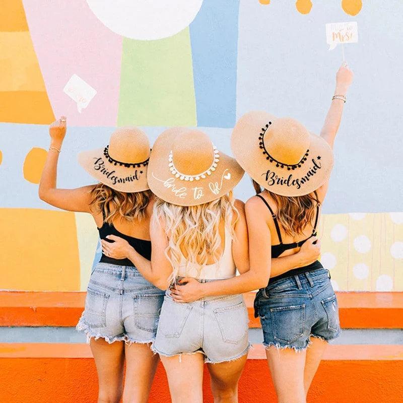 bride-to-be + bridesmaid pom floppy hats - basil boutique