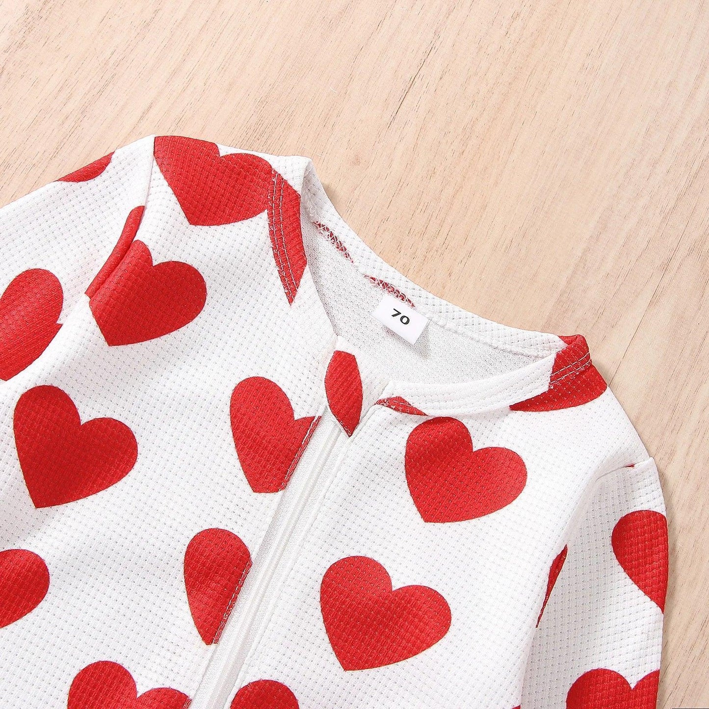 heart long sleeve onesie - basil boutique