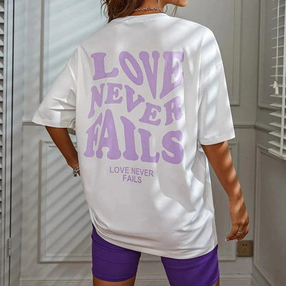 love never fails oversized t-shirt - basil boutique