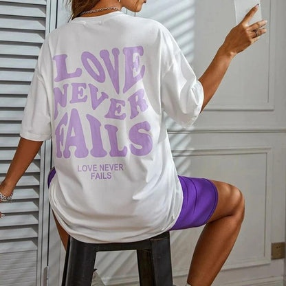 love never fails oversized t-shirt - basil boutique